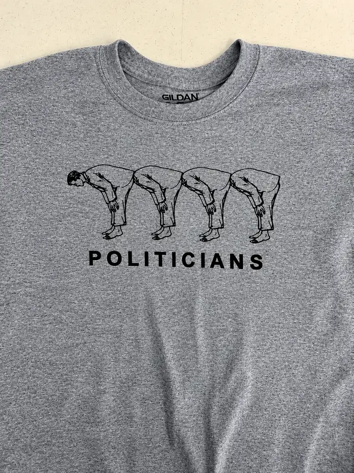 Grey T-shirt with a fine-line illustration above the word Politicians